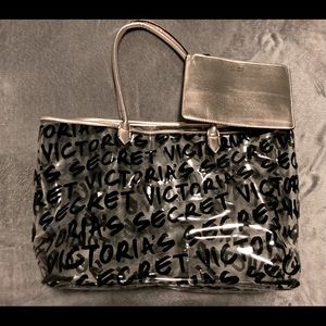 Victoria’s Secret large clear tote bag, VS logo and small gold attached pouch.